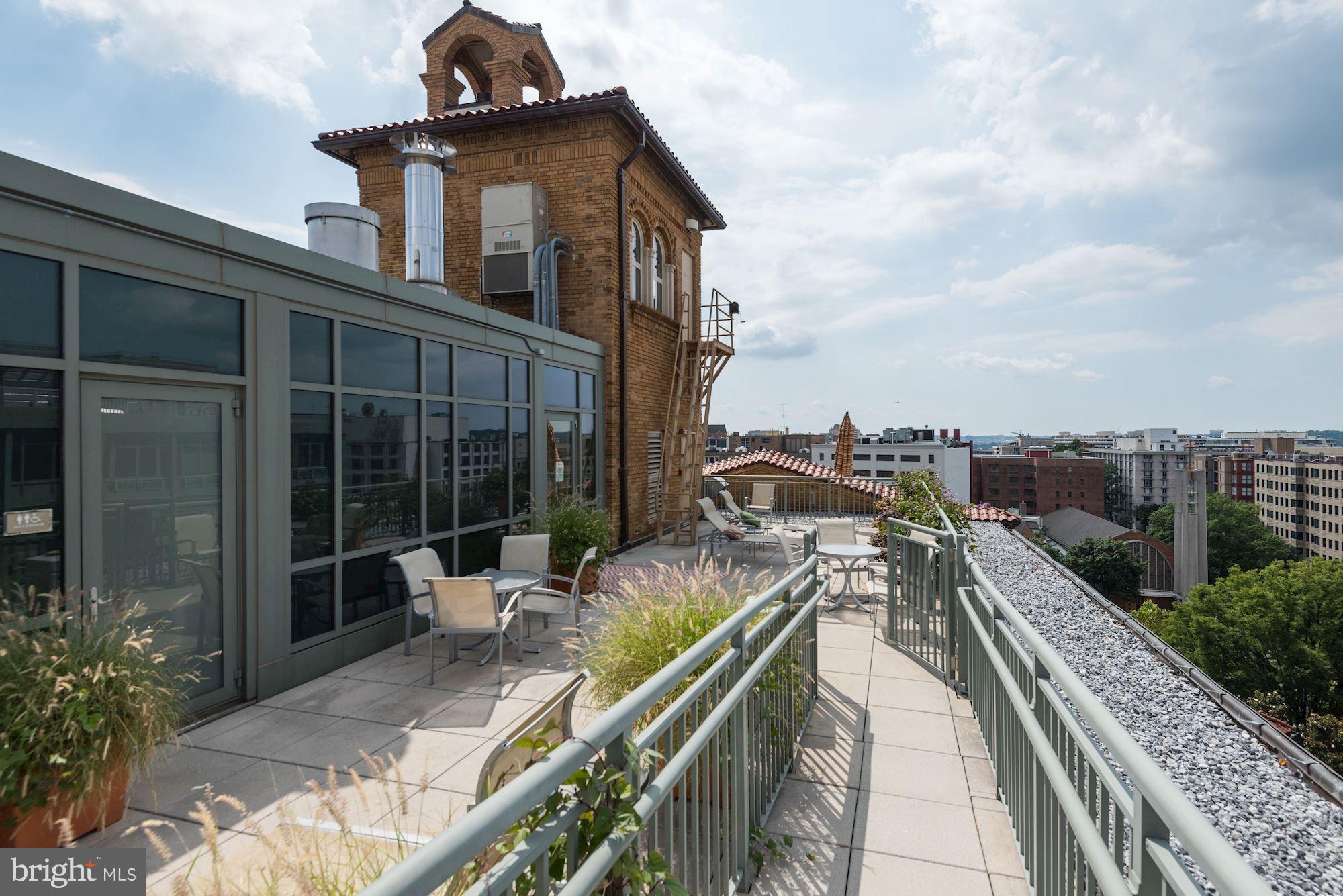 2425 L Street Northwest, Unit 539 Washington, DC 20037 - Photo 23 of 31 a view of a balcony with chairs
