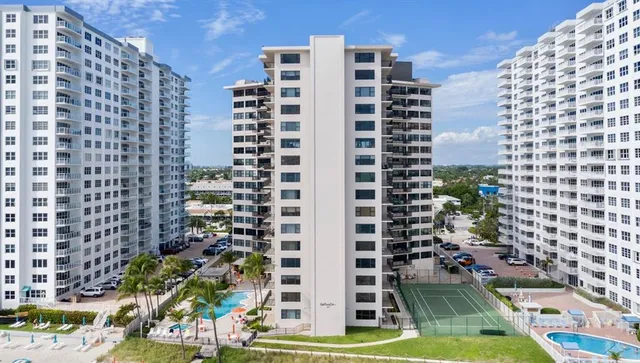 a view of a city with tall buildings