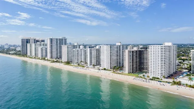 a view of a city with tall buildings