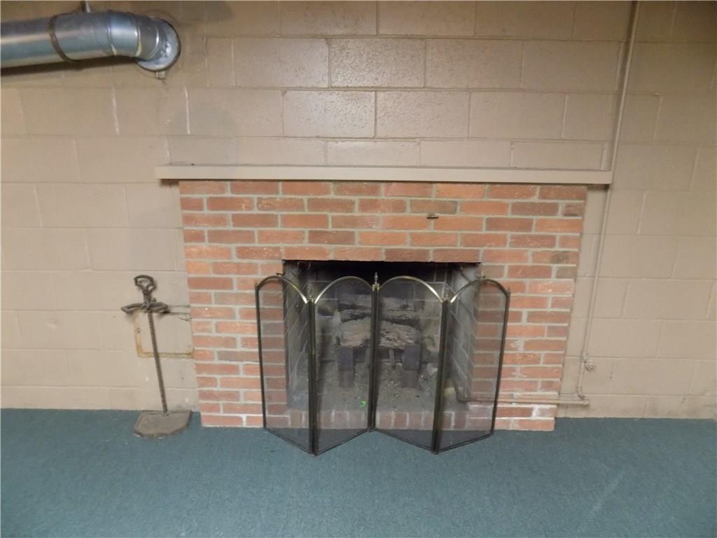 225 Beverly Way Butler, PA 16001 - Photo 12 of 18 Lower level has a second fireplace, finish this space for additional living space.