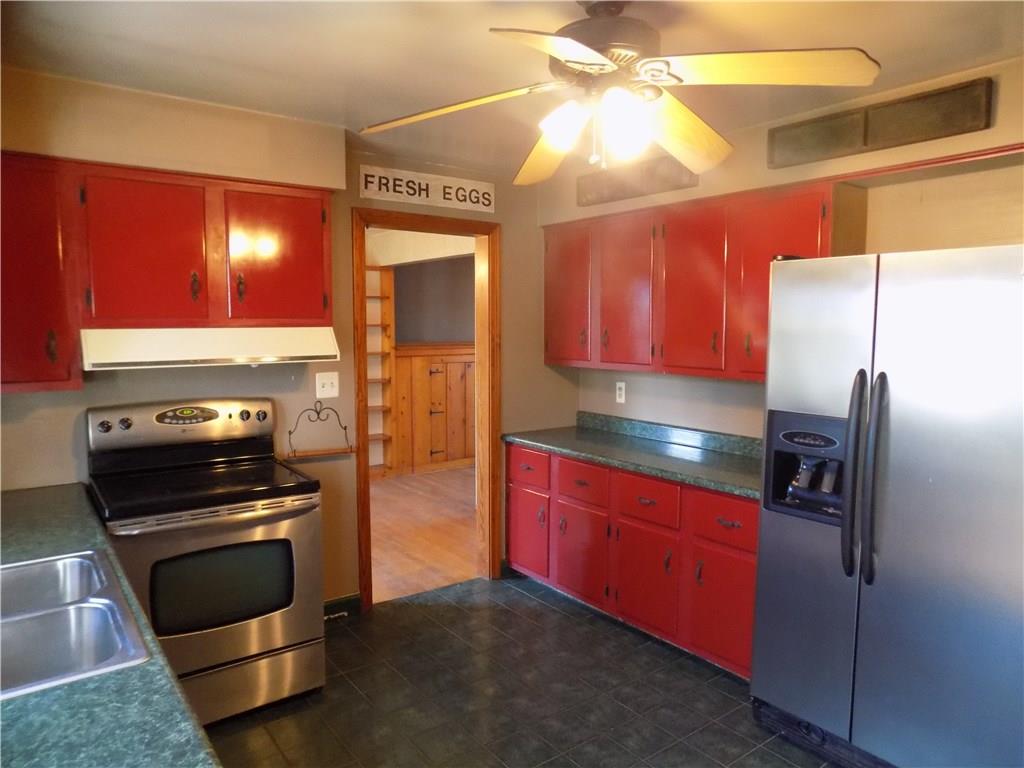 225 Beverly Way Butler, PA 16001 - Photo 3 of 18 Lovely country kitchen with stainless appliances and ceiling fan. Tons of counter space and storage.
