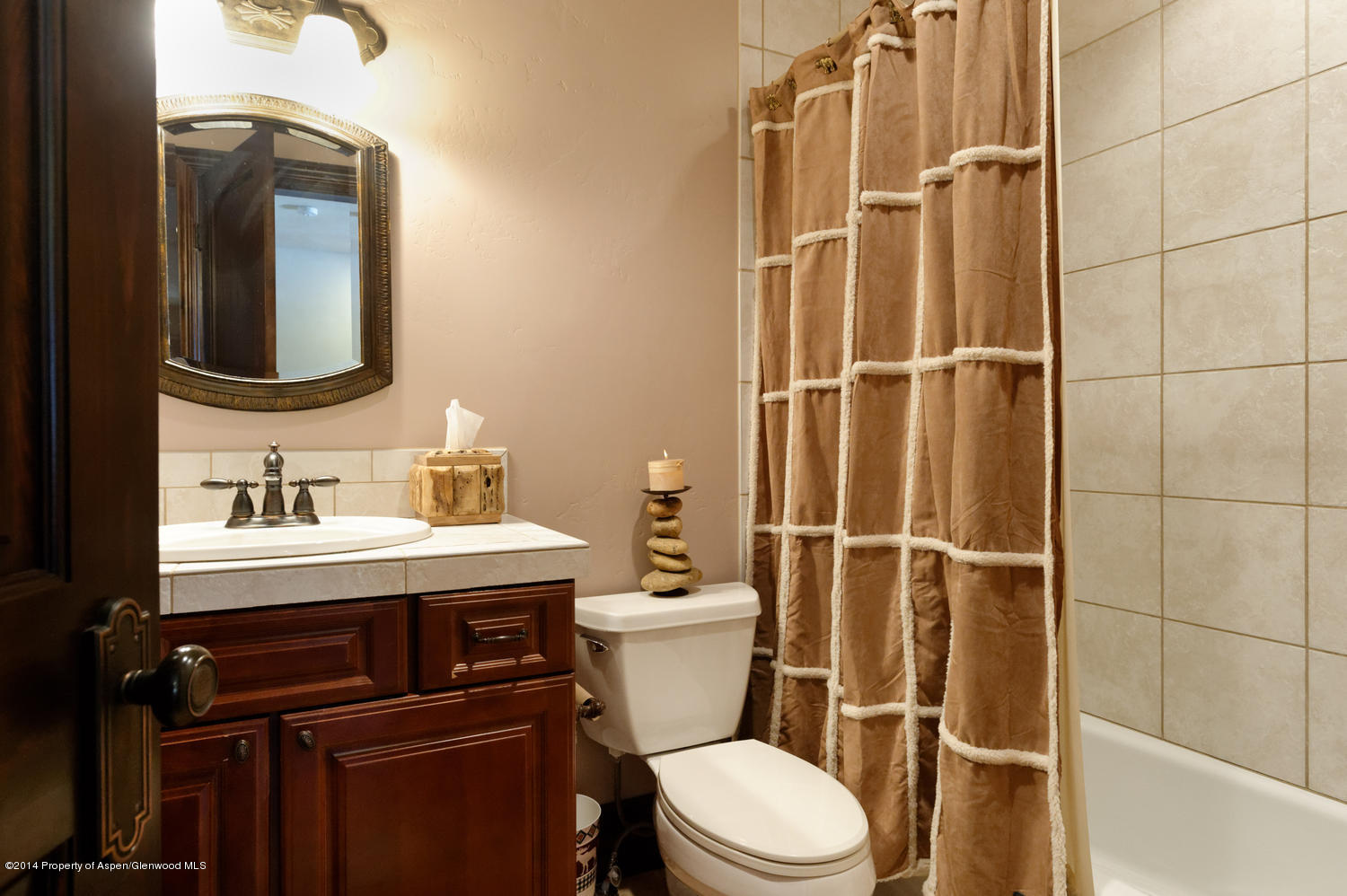 356 Hillcrest Drive Basalt, CO 81621 - Photo 16 of 29 a bathroom with a toilet a sink and mirror