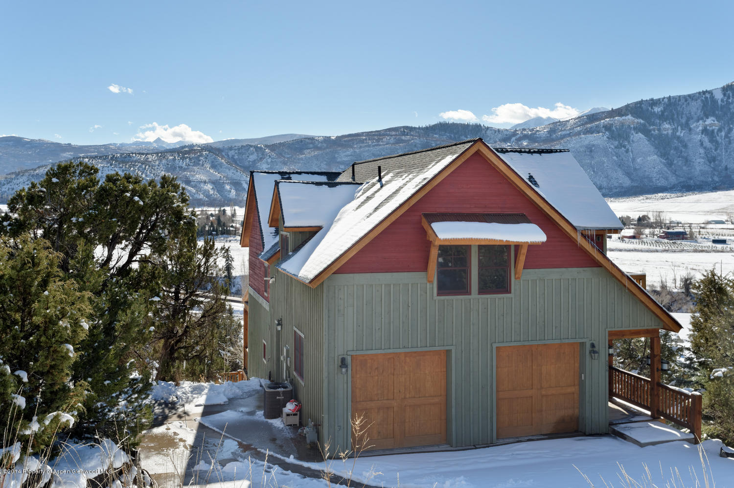 356 Hillcrest Drive Basalt, CO 81621 - Photo 2 of 29 a front view of house with yard and trees in the background
