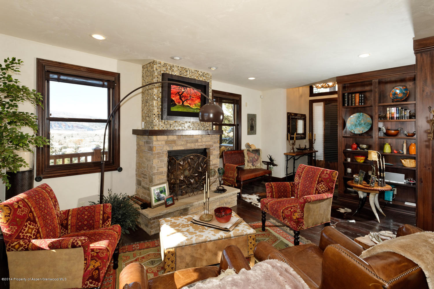 356 Hillcrest Drive Basalt, CO 81621 - Photo 5 of 29 a living room with fireplace furniture and a flat screen tv