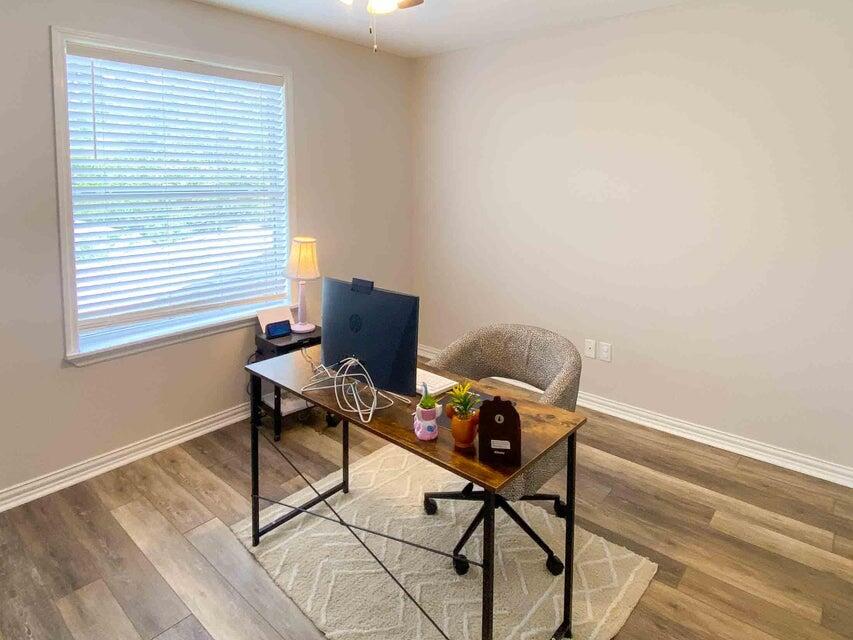 116 Dolphin Road Mary Esther, FL 32569 - Photo 11 of 13 a work room with furniture and a window