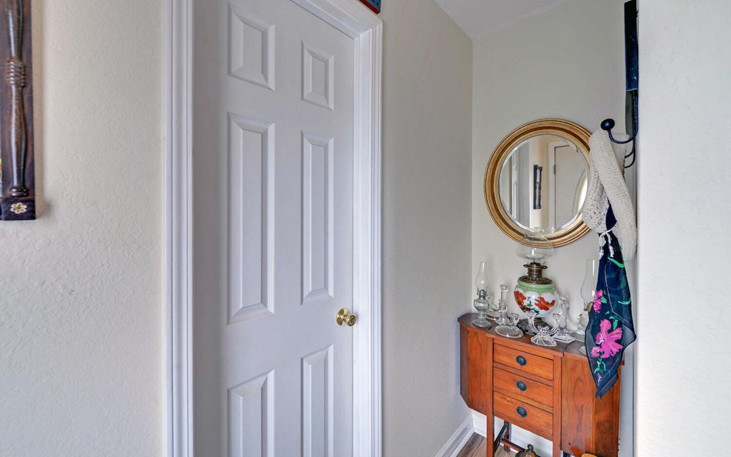 7300 Mr Bert Road Hiawassee, GA 30546 - Photo 24 of 48 a bathroom with a sink a mirror and a shower curtain