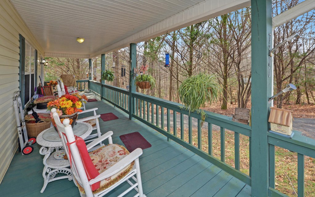 7300 Mr Bert Road Hiawassee, GA 30546 - Photo 25 of 48 workspace with wooden floor stairs and furniture