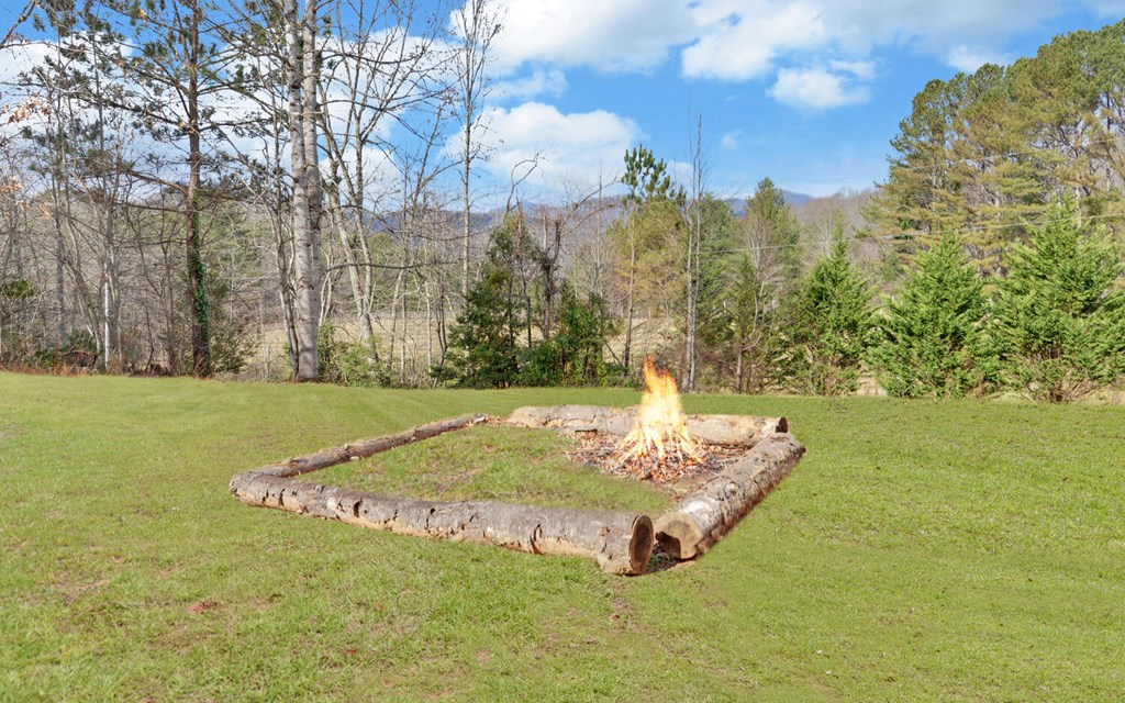 7300 Mr Bert Road Hiawassee, GA 30546 - Photo 44 of 48 a view of a water fountain in front of the house