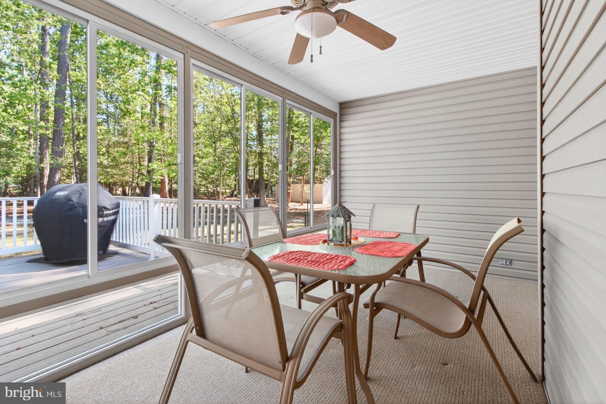 34371 Owls Nest Road Lewes, DE 19958 - Photo 39 of 58 a view of a dining room with furniture window and outside view