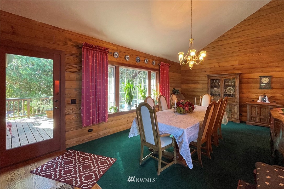 1006 Happy Valley Road Sequim, WA 98382 - Photo 19 of 40 a view of a dining room with furniture window and outside view