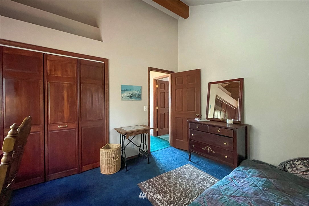 1006 Happy Valley Road Sequim, WA 98382 - Photo 28 of 40 a room with furniture and wooden floor