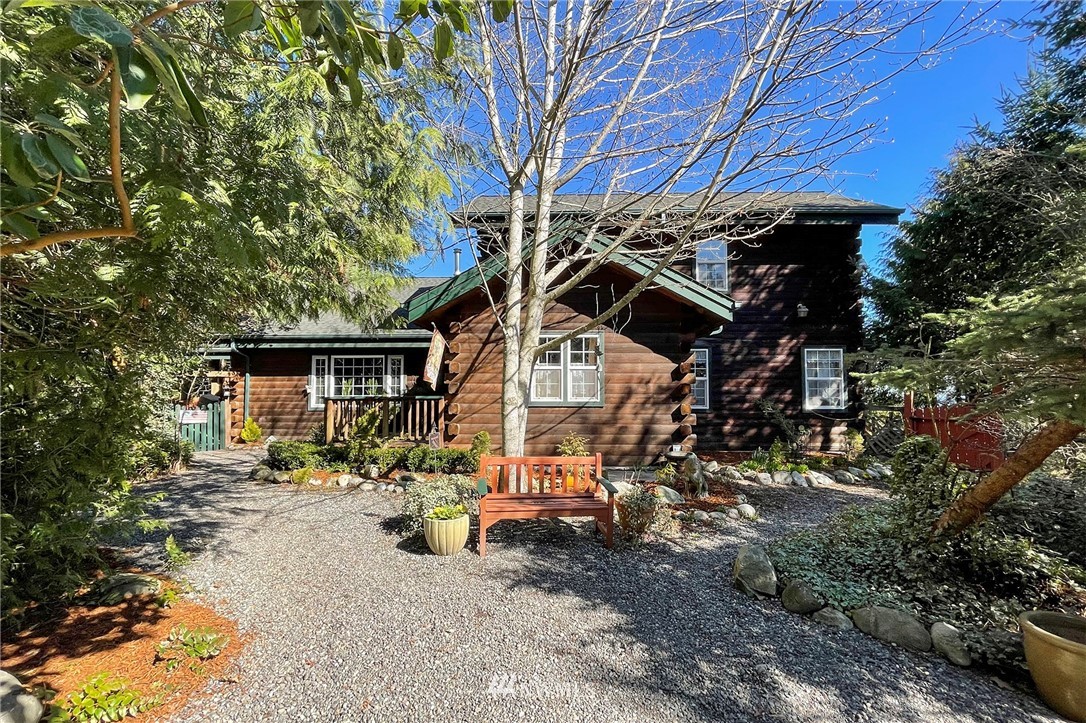 1006 Happy Valley Road Sequim, WA 98382 - Photo 6 of 40 a view of a car park in front of a house