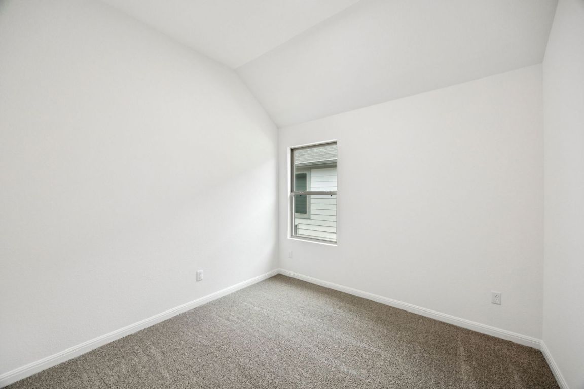 435 Lucky Avenue Elgin, TX 78621 - Photo 23 of 36 a view of an empty room and window
