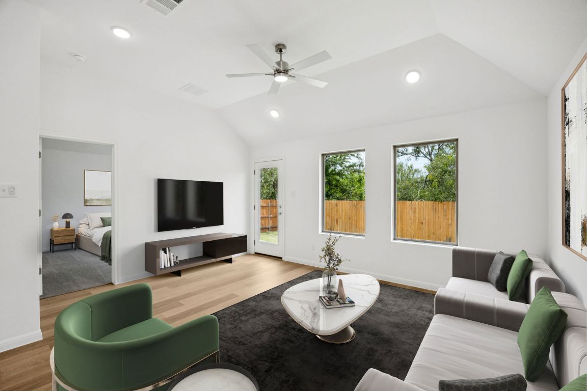 435 Lucky Avenue Elgin, TX 78621 - Photo 10 of 36 a living room with furniture and a large window
