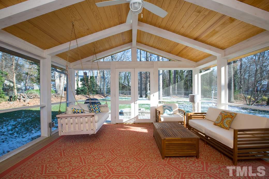 7404 Fiesta Way Raleigh, NC 27615 - Photo 10 of 11 a living room with furniture and a large window