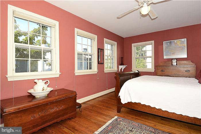 1208 Portner Road Alexandria, VA 22314 - Photo 11 of 30 a spacious bedroom with a bed and window