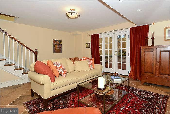 1208 Portner Road Alexandria, VA 22314 - Photo 18 of 30 a living room with furniture and a window