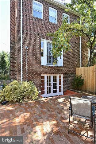 1208 Portner Road Alexandria, VA 22314 - Photo 25 of 30 a view of a house with a bench