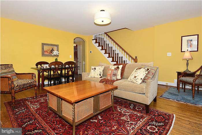 1208 Portner Road Alexandria, VA 22314 - Photo 8 of 30 a living room with furniture and a table