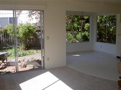 2829 Yuma Court Santa Rosa, CA 95403 - Photo 5 of 7 a view of backyard and floor to ceiling window