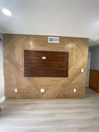 a bathroom with a shower and a sink