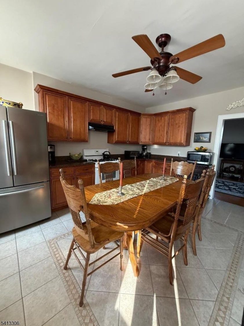 69 2nd Avenue Raritan, NJ 08869 - Photo 5 of 12 a view of a dining room with furniture window and wooden floor