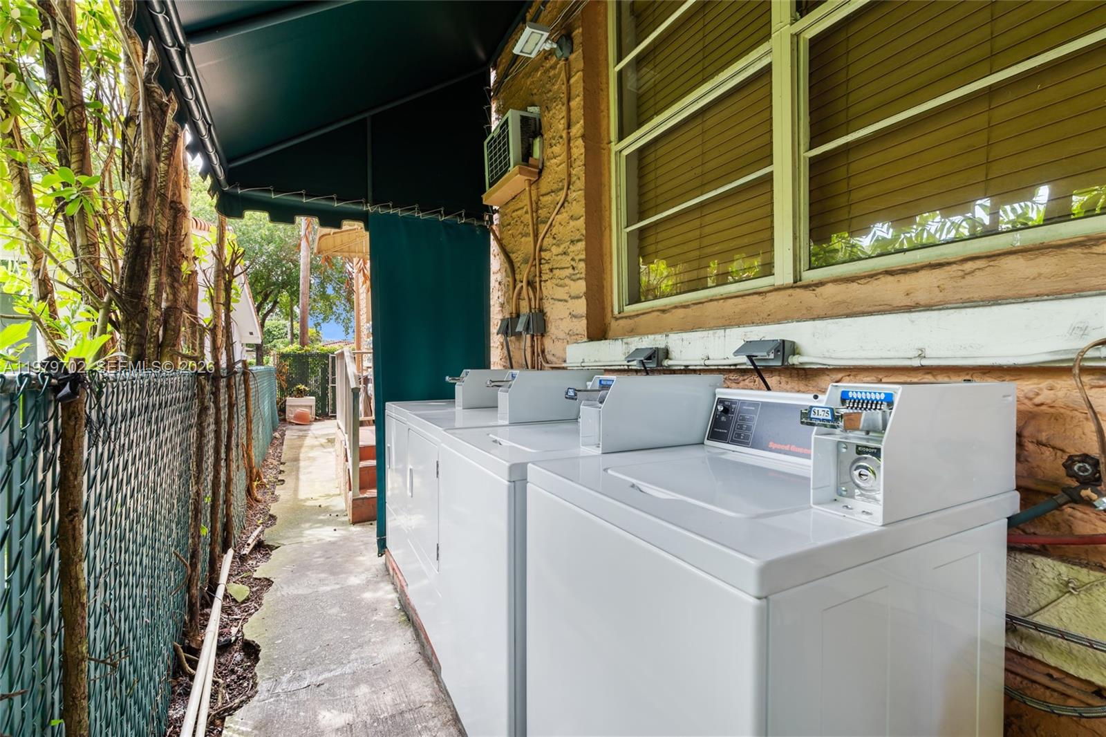 3409 South Le Jeune Road Coral Gables, FL 33134 - Photo 52 of 53 a utility room with dryer and washer
