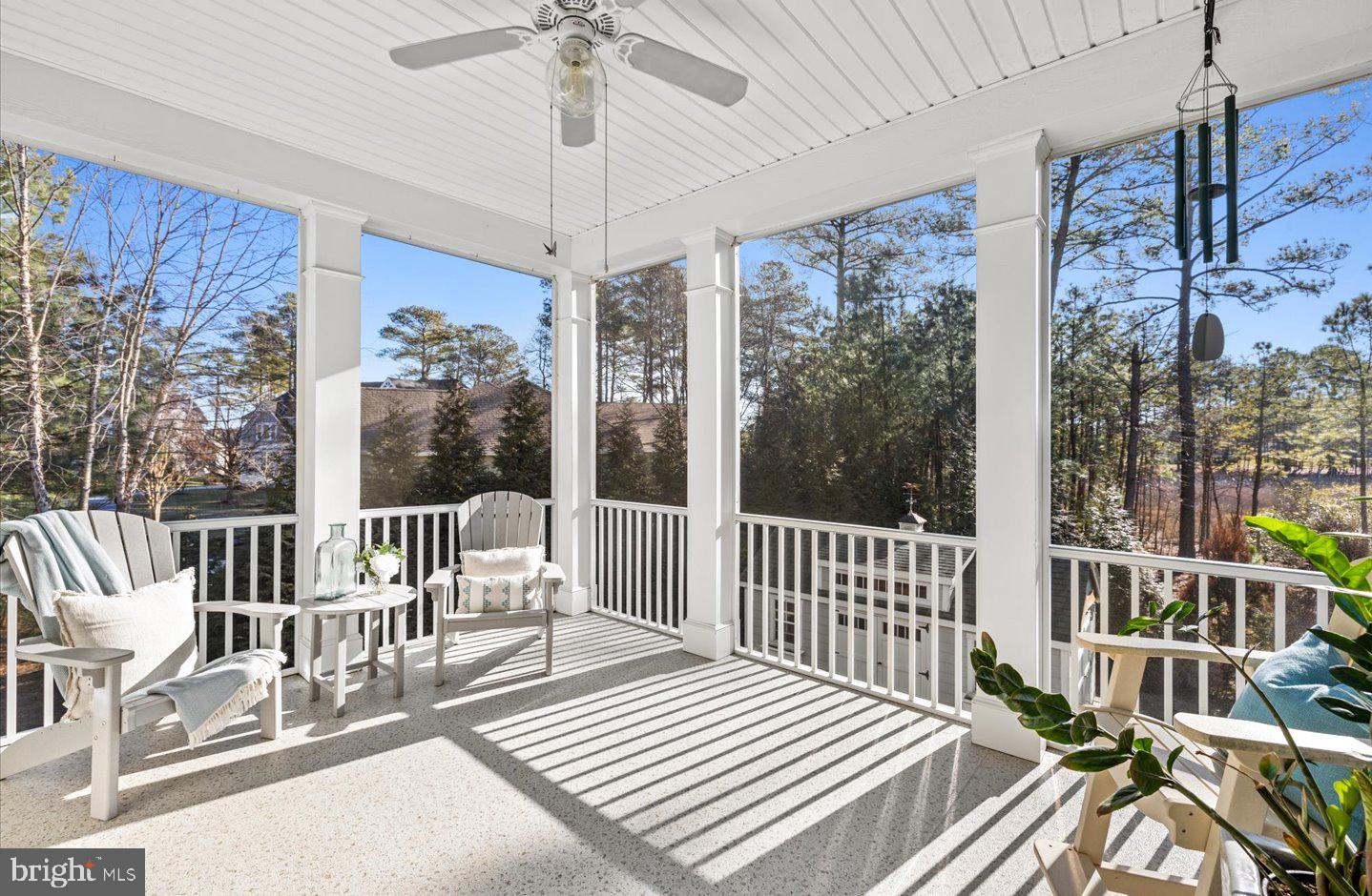 23280 Horse Island Road Lewes, DE 19958 - Photo 12 of 71 a view of a balcony with wooden floor
