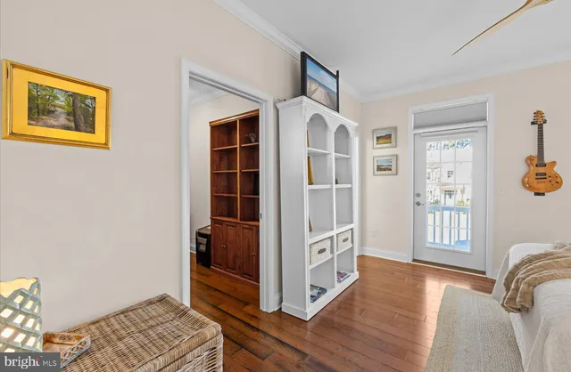 a bedroom with a bed and a table in it