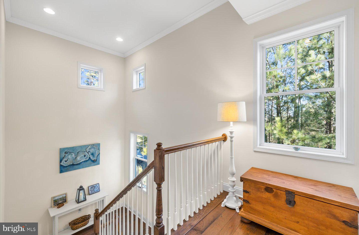 23280 Horse Island Road Lewes, DE 19958 - Photo 29 of 71 a view of a hallway with windows