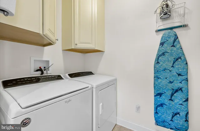 a bedroom with a large bed and a large window