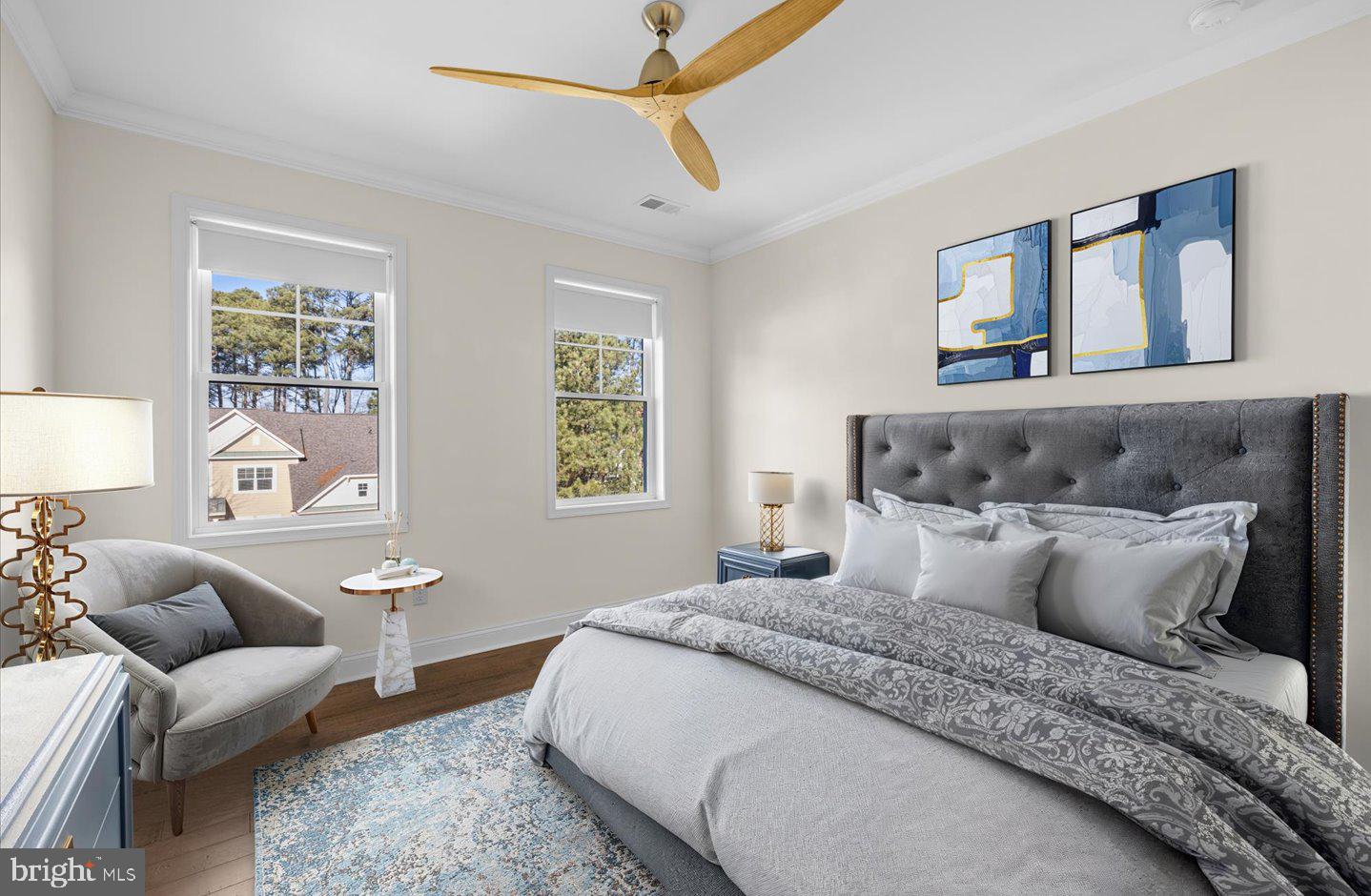 23280 Horse Island Road Lewes, DE 19958 - Photo 35 of 71 a bedroom with a large bed couch and window