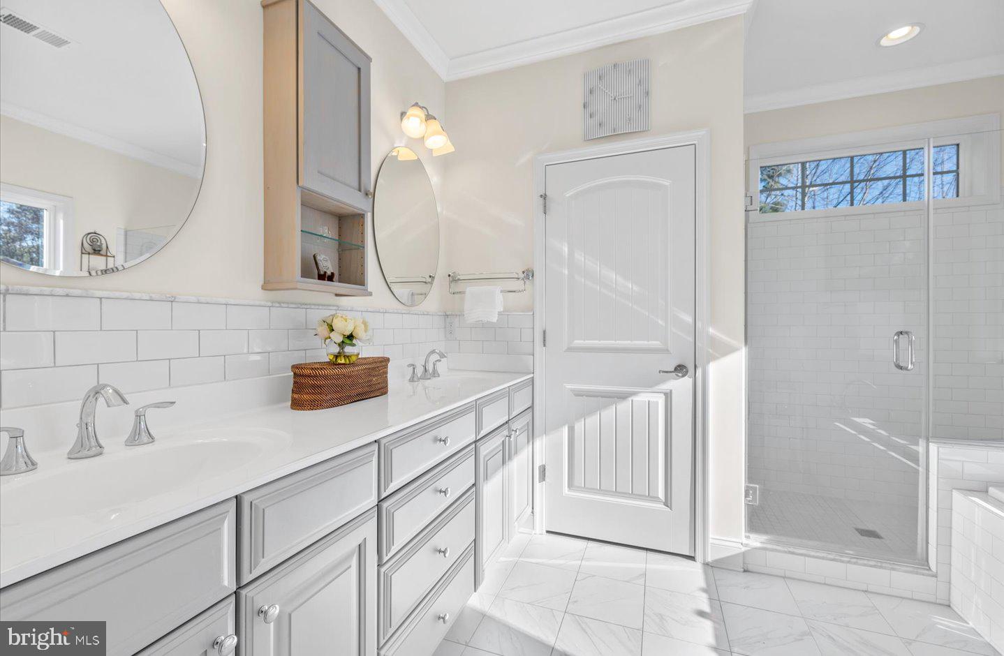 23280 Horse Island Road Lewes, DE 19958 - Photo 43 of 71 a bathroom with a sink a toilet and shower