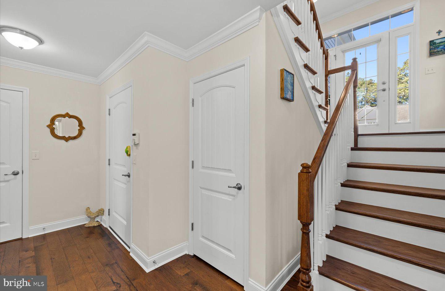 23280 Horse Island Road Lewes, DE 19958 - Photo 46 of 71 a view of entryway with stairs and wooden floor