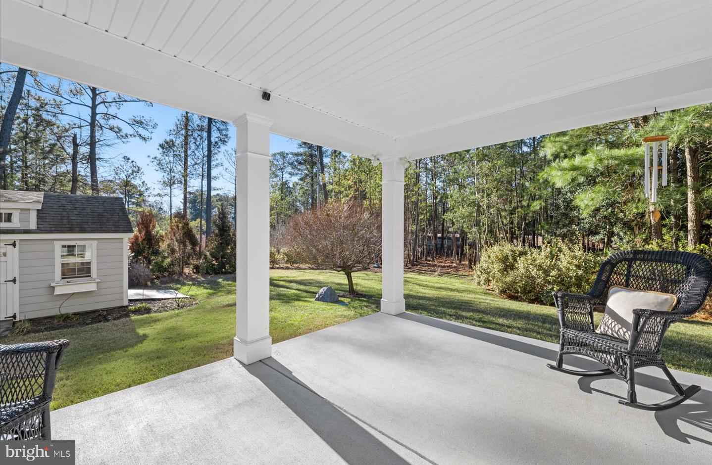 23280 Horse Island Road Lewes, DE 19958 - Photo 52 of 71 a view of a porch with furniture and garden