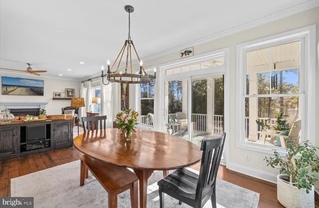 a view of a balcony with wooden floor
