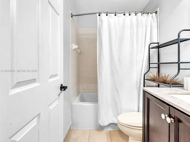 a view of a swimming pool with a yard