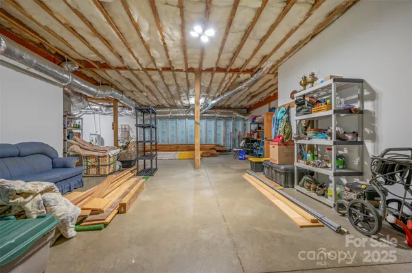 a bathroom with a sink mirror and toilet