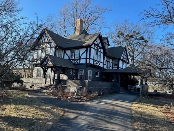 a front view of a building with street view