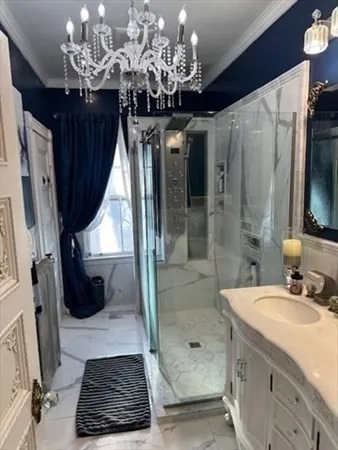 a bathroom with a sink and a mirror