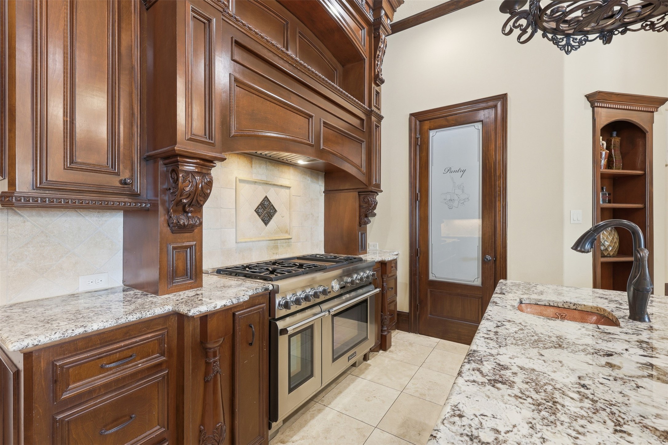 14 Post Shadow Estate Drive Spring, TX 77389 - Photo 15 of 49 a kitchen with stainless steel appliances granite countertop a stove a sink and a refrigerator