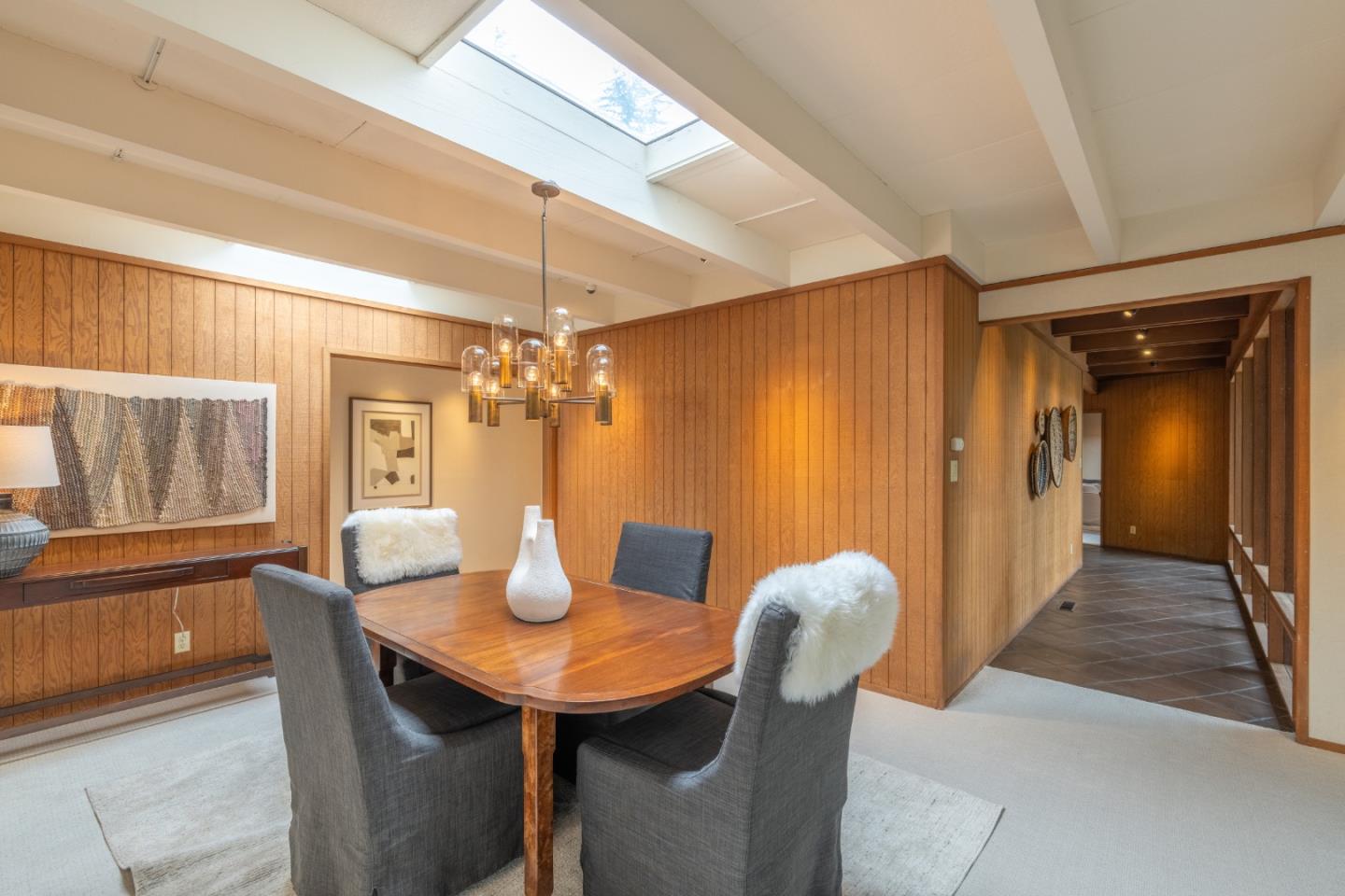 46 Middle Canyon Road Carmel Valley, CA 93924 - Photo 17 of 74 a view of a dining room with furniture and wooden floor