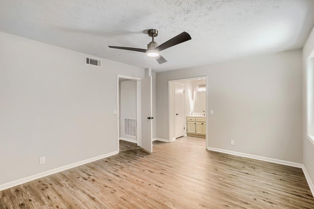 2021 Irwin Bridge Road Northwest Conyers, GA 30012 - Photo 27 of 43 a view of empty room with wooden floor