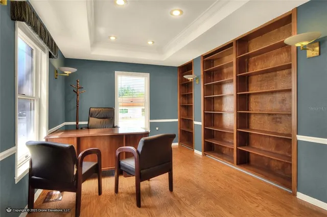 a kitchen with stainless steel appliances granite countertop a sink and a microwave