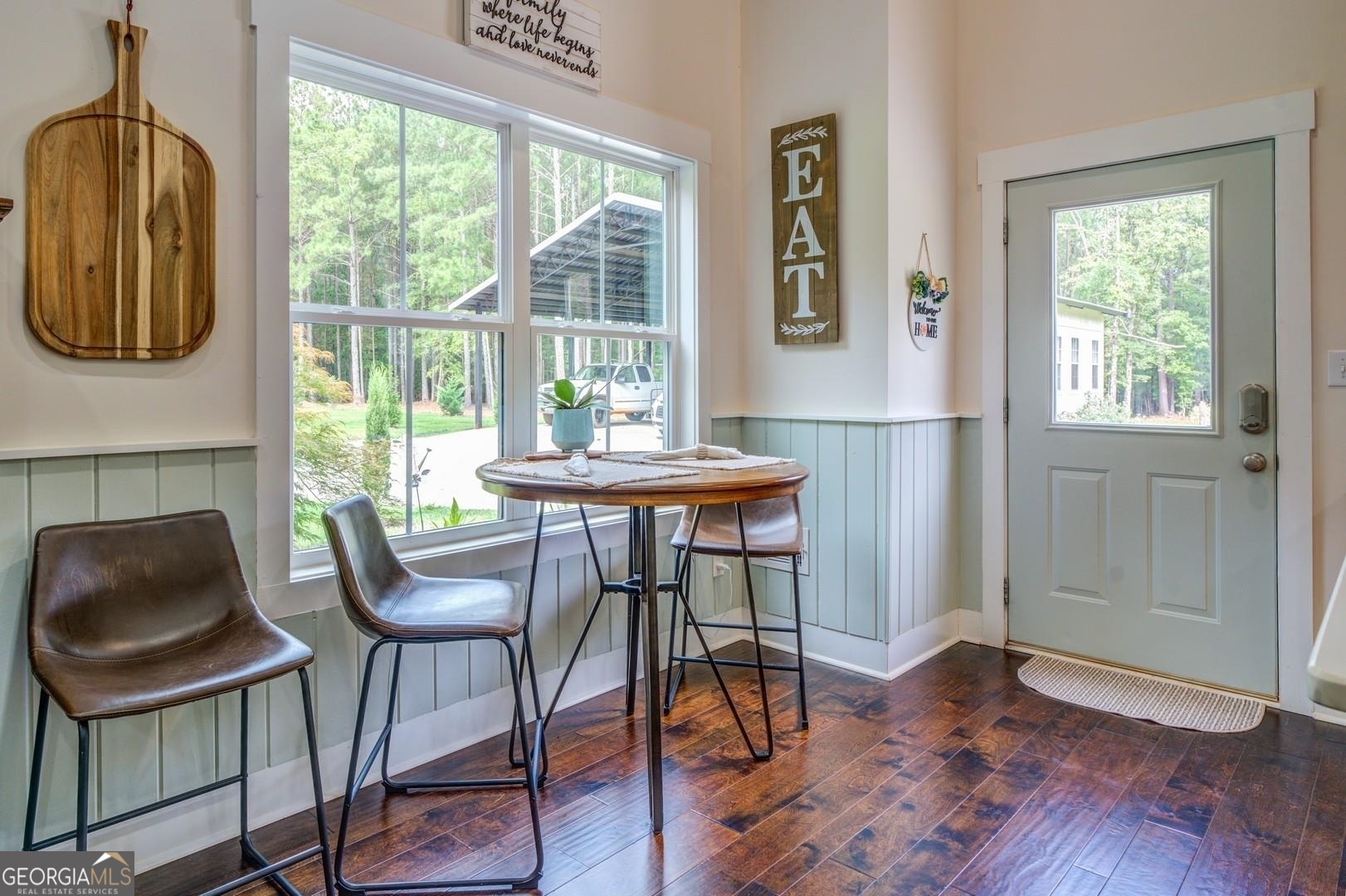 3060 Eatonton Road Madison, GA 30650 - Photo 15 of 65 a dining room with furniture and a window