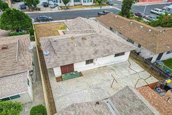 an aerial view of a house with swimming pool