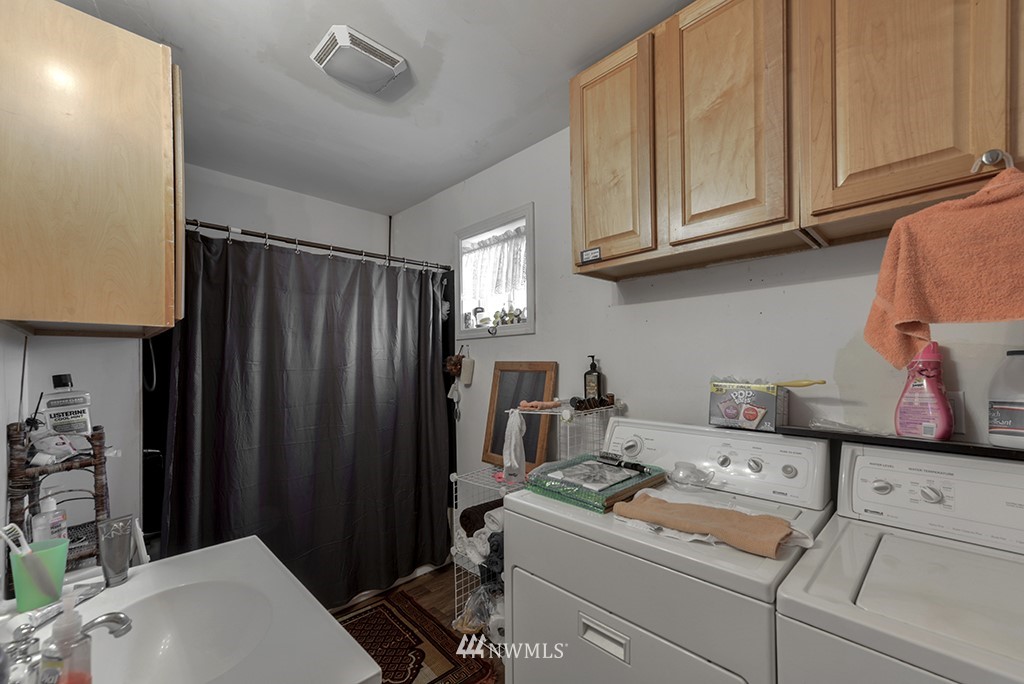 2906 Northeast 7th Street Renton, WA 98056 - Photo 22 of 25 a room with storage and utility