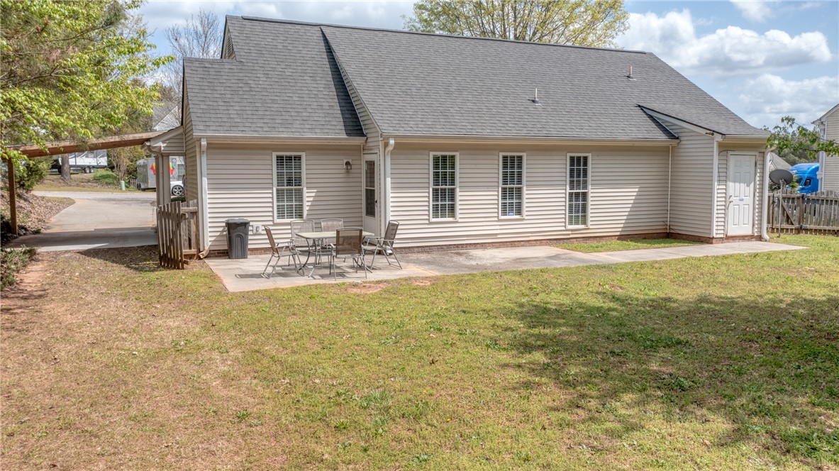 102 Hawk Ridge Drive Anderson, SC 29621 - Photo 26 of 38 This residence features a patio for outdoor living and a practical carport for sheltered parking.
