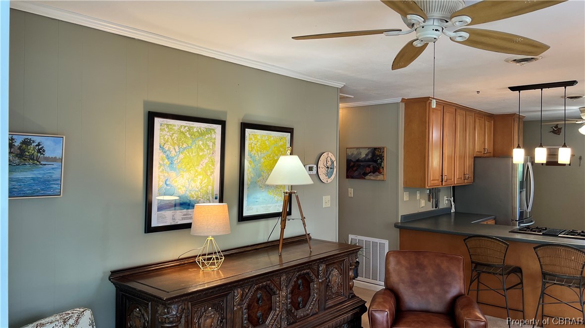 88 Leachwood Road Lancaster, VA 22503 - Photo 37 of 49 a room with furniture and a window