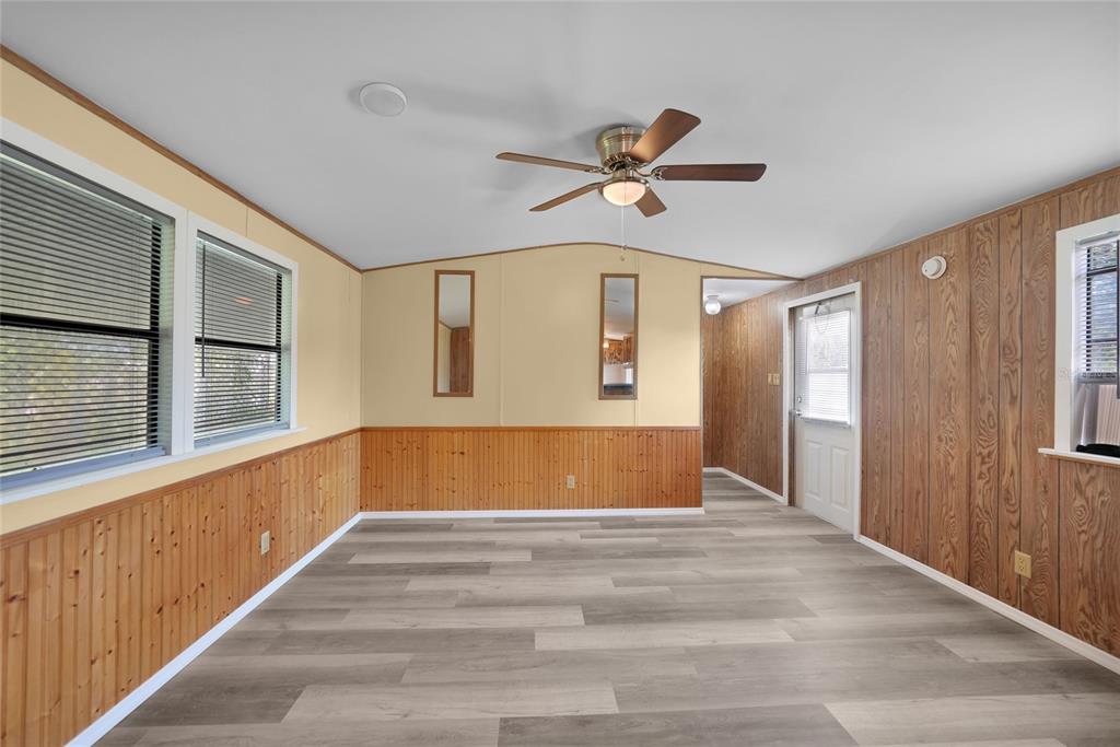 1298 Southeast Lake Road Arcadia, FL 34266 - Photo 3 of 35 a bathroom with a bathtub and a window